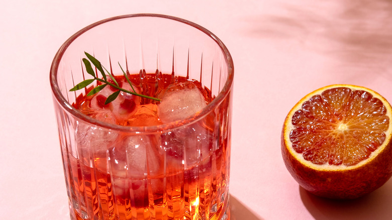 Orange liquor in a glass with an orange slice