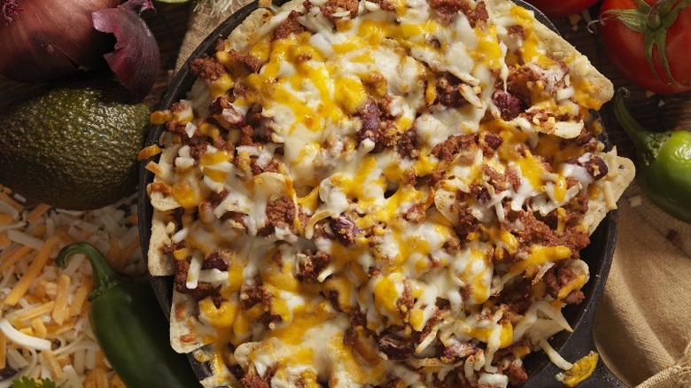 iron skillet with loaded nachos