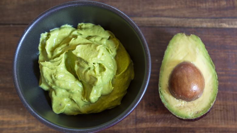 Bowl of mashed avocado