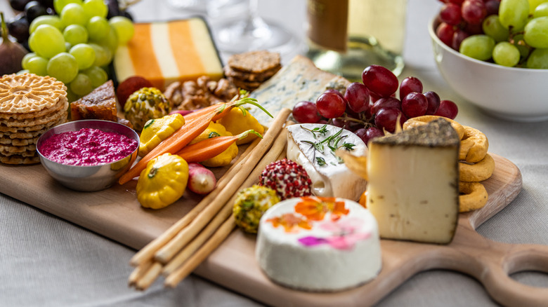 charcuterie board with grapes