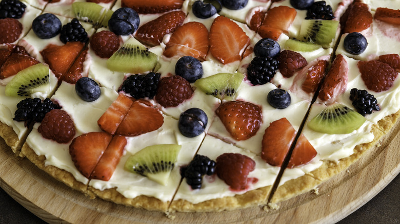 fruit pizza on cutting board