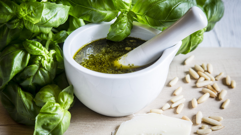 Mortar pestle basil pesto