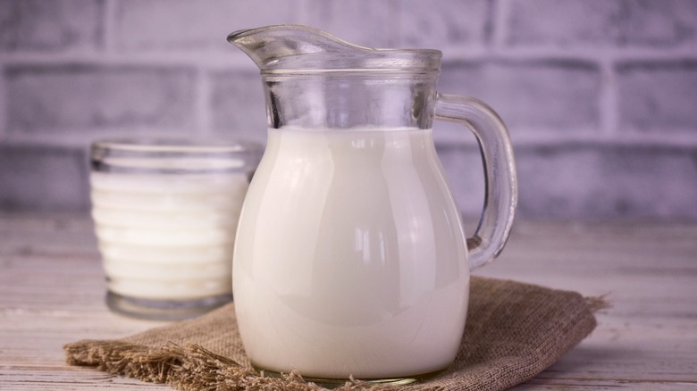 Pitcher and glass of buttermilk