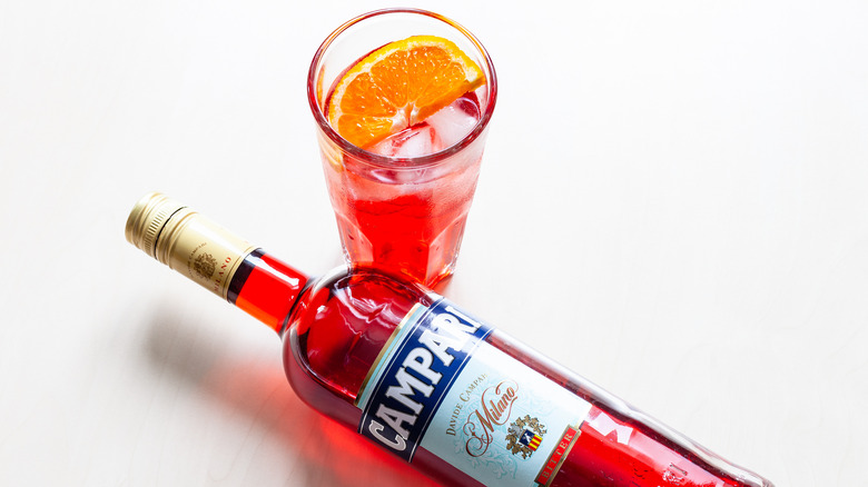Bottle of Campari and cocktail
