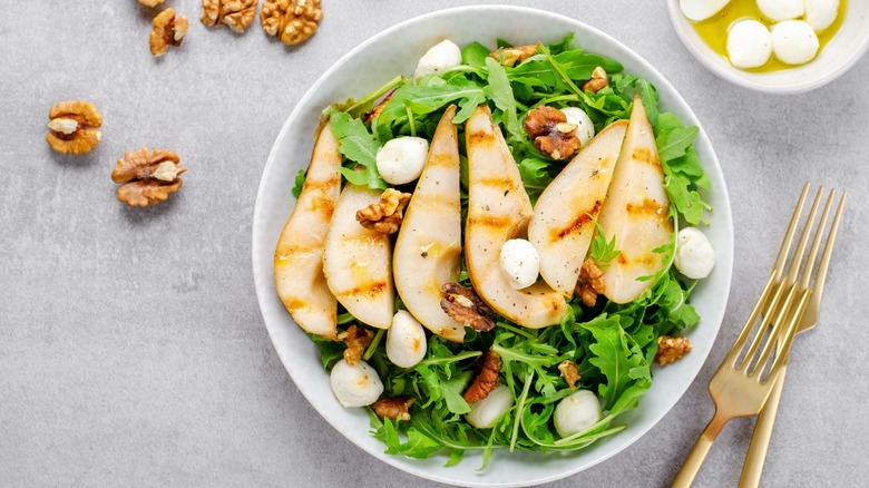 grilled pear salad with walnuts and cheese