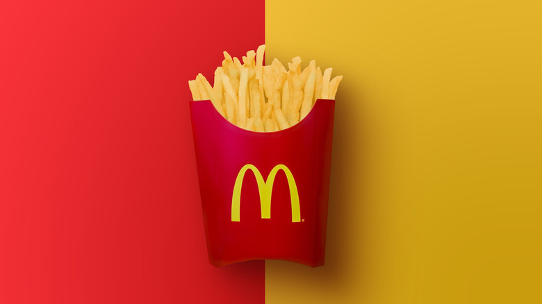 McDonald's fries on a yellow and red background