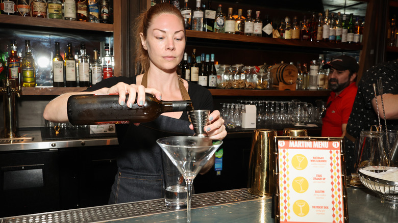 Bartender preparing a martini