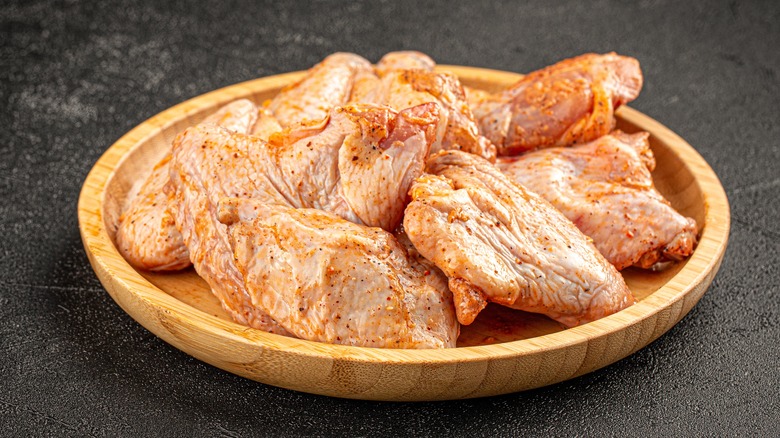 Raw marinated chicken