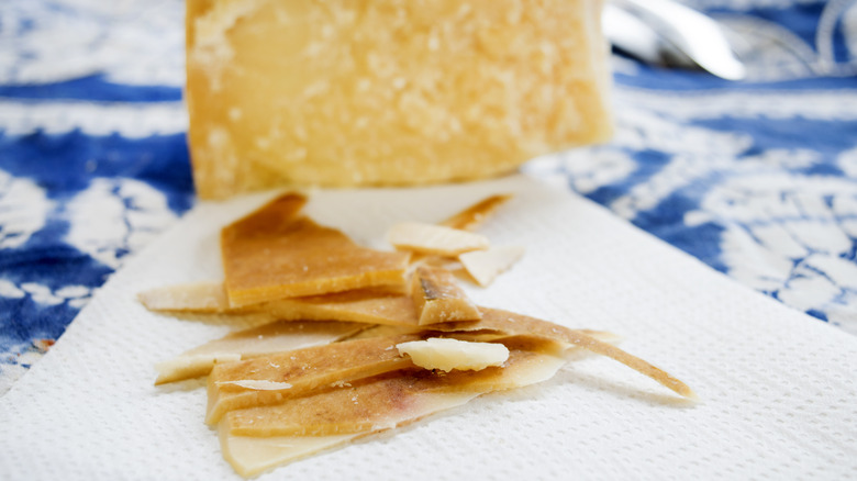 Scraps of parmesan rind on paper towel