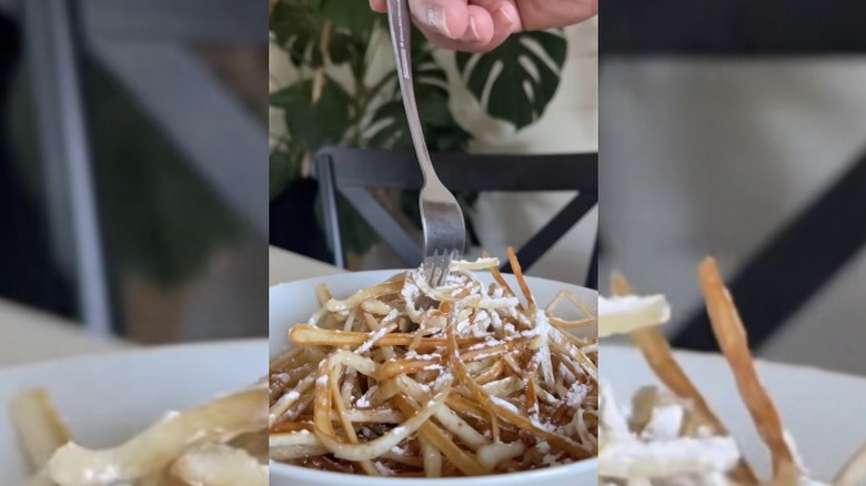 hand twirling pancake spaghetti 