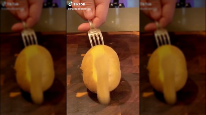 peeling potatoes with a fork