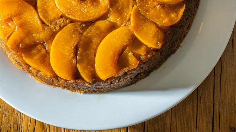 Peach upside-down cake on plate 