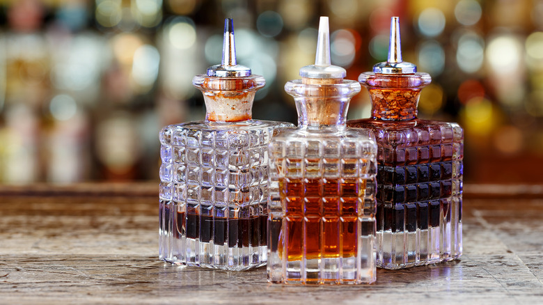 selection of bitters in glass decanters