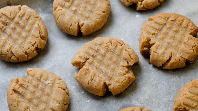 Peanut butter cookies on lined baking sheet