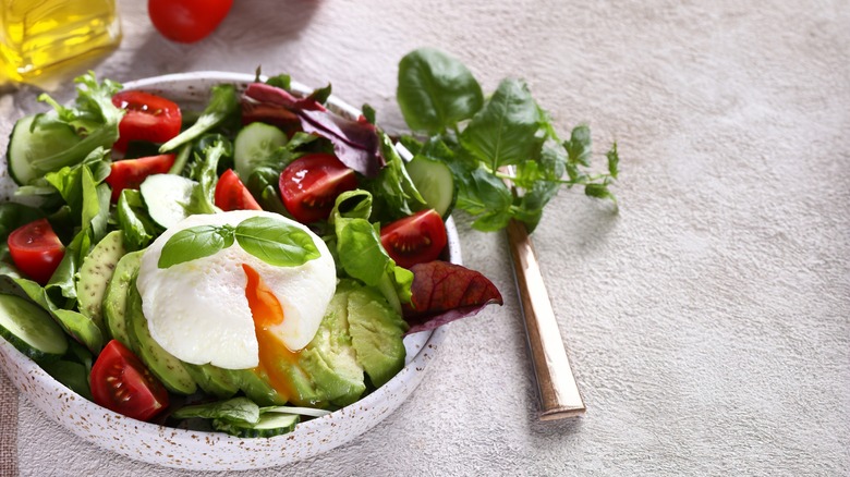 Salad with a poached egg