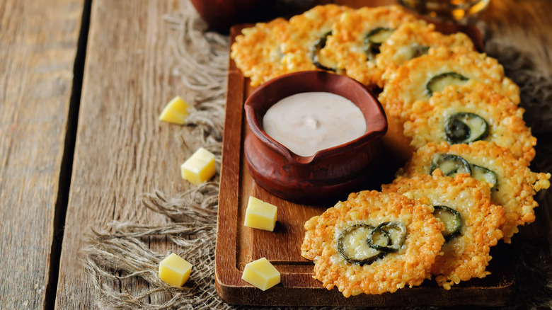 parmesan crisps topped with jalepenos and served with a creamy dip