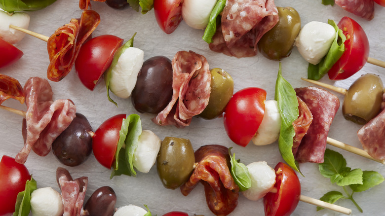 Meat and olive skewers