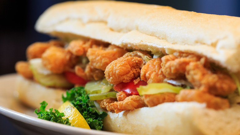 Shrimp po'boy sandwich on plate