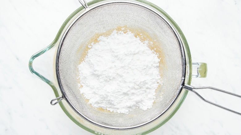 powdered sugar sifted into butter
