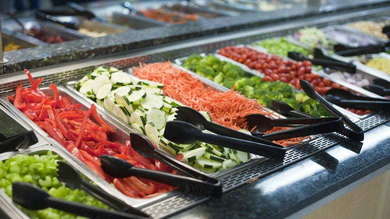 salad bar with vegetable toppings