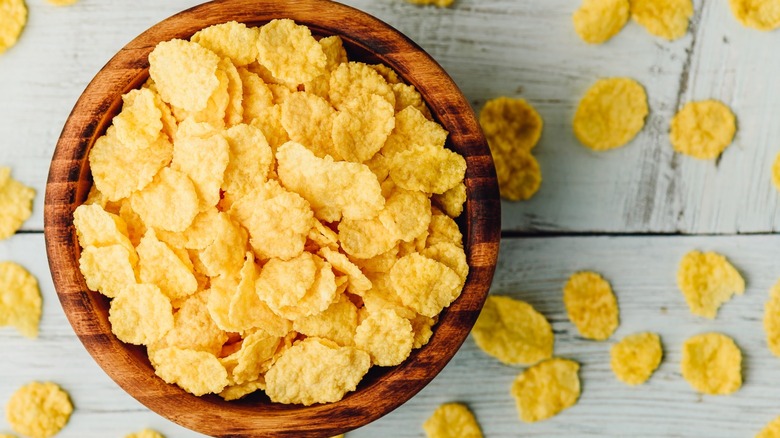 cornflakes in wooden bowl