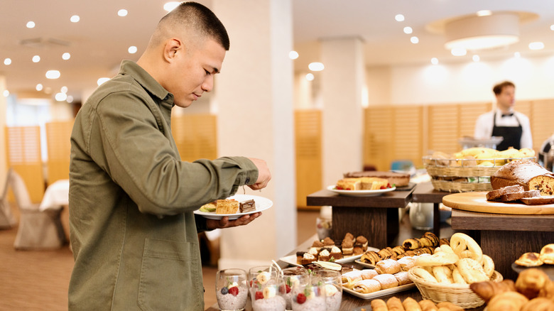 man at breakfast buffet