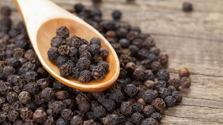 Peppercorns on spoon