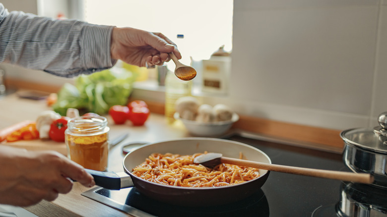 yellow spice over cooking pan