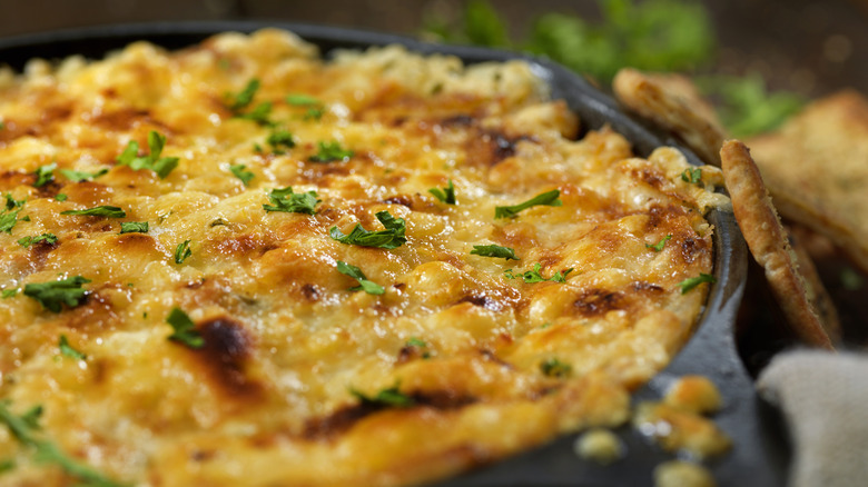 skillet of artichoke dip