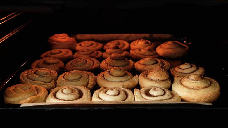 Cinnamon rolls baking in oven