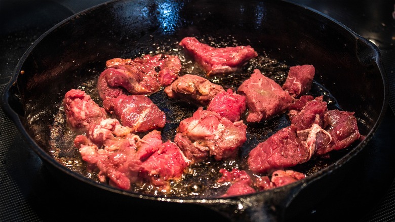 Seared beef in cast iron skillet 