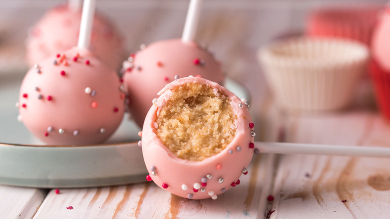 Pink chocolate-coated cake pops