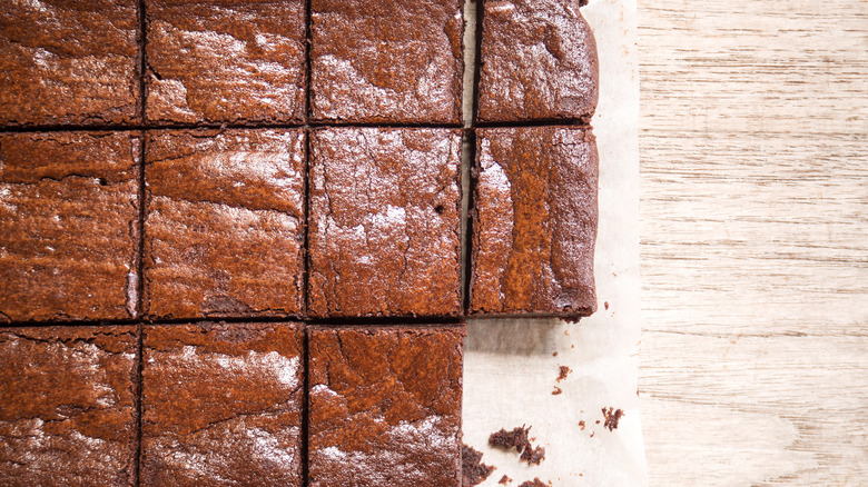 perfectly cut brownies on cutting board