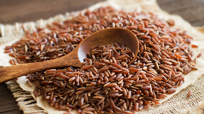 Pile of uncooked red rice.