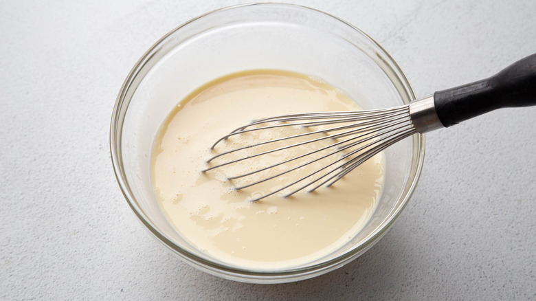 cream and whisk in bowl