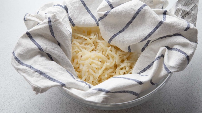 hash browns in a kitchen towel