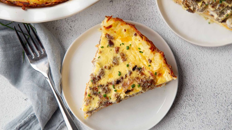 slice of quiche with hash brown crust