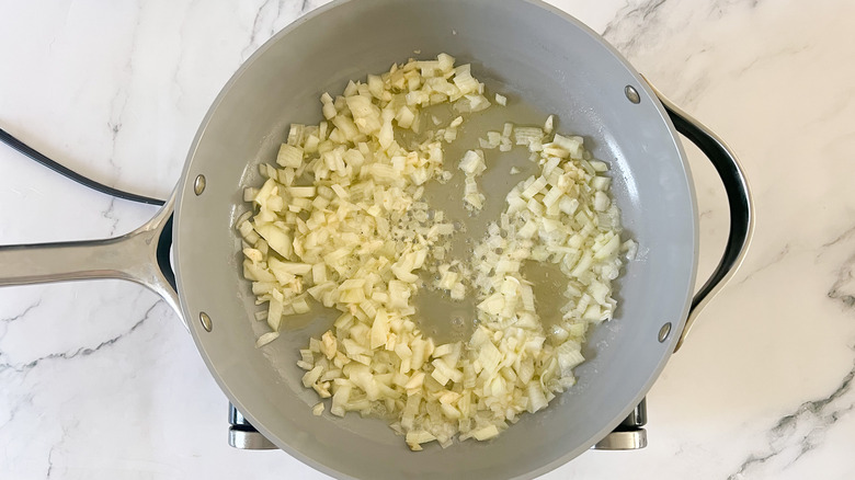 onions and garlic in pan