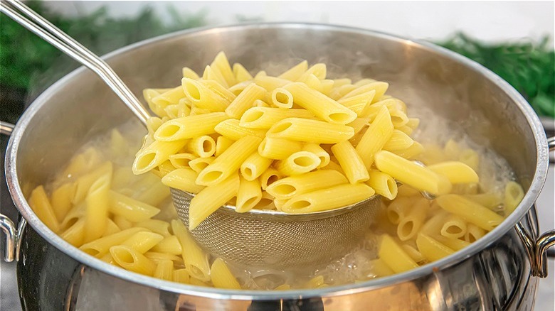 Penne pasta in boiling water 