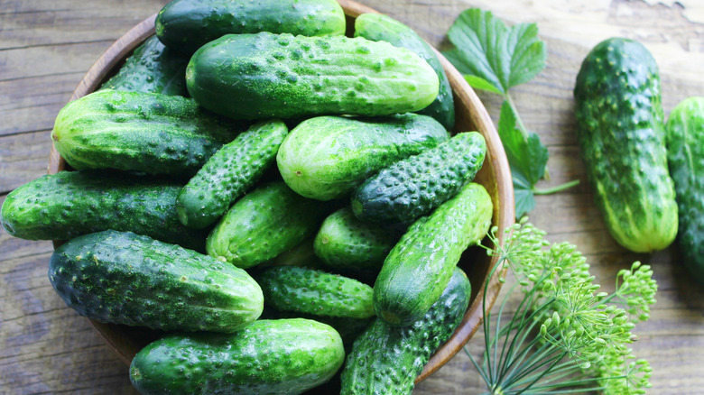 A bowl of dill pickles