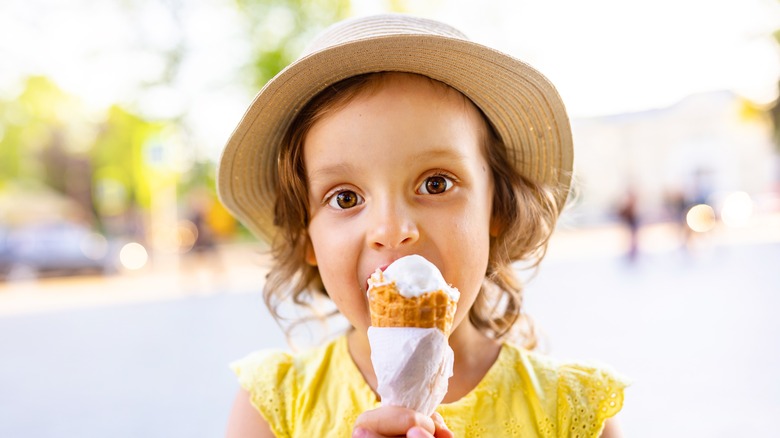 Child eating ice cream cone