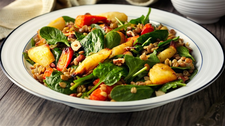 Roasted vegetables in salad with seeds 