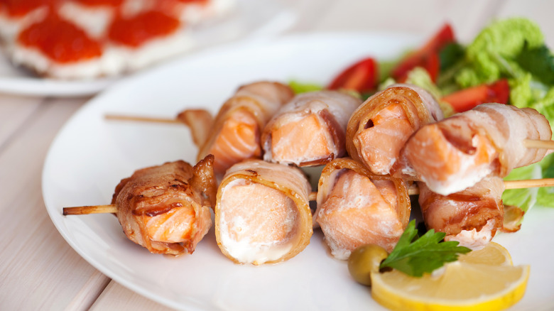 Bacon-wrapped salmon skewers