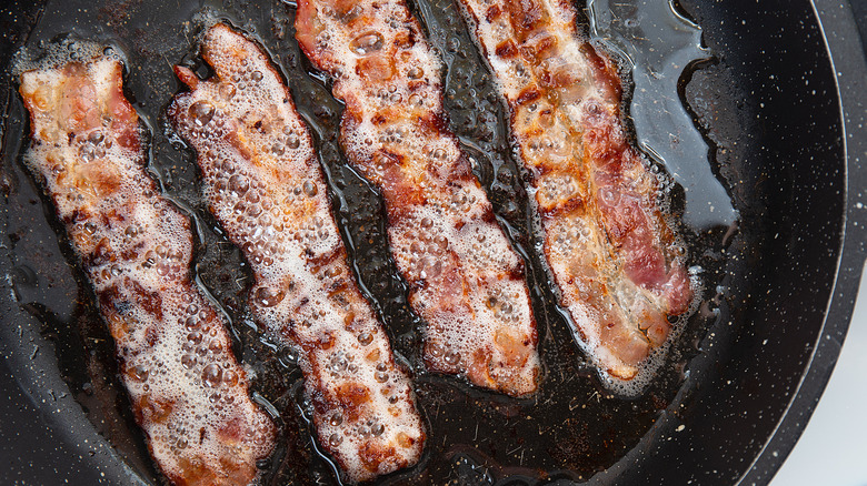 Bacon frying in pan