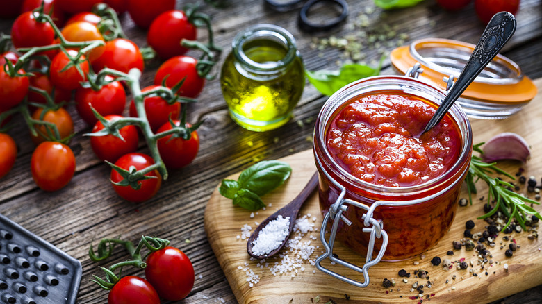 Jar of sauce with tomatoes