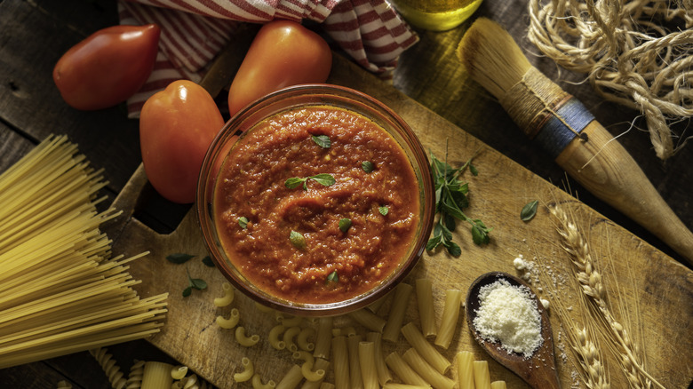 Tomato sauce on wooden board