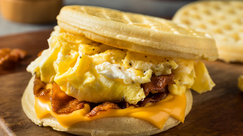 Breakfast waffle sandwich with egg, bacon, and cheese