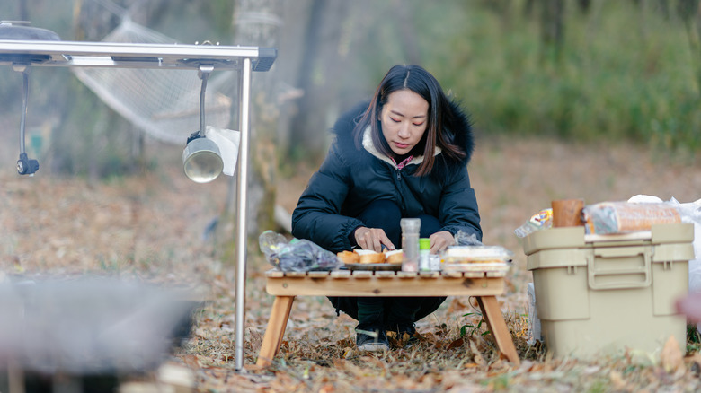 Person making breakfast while camping