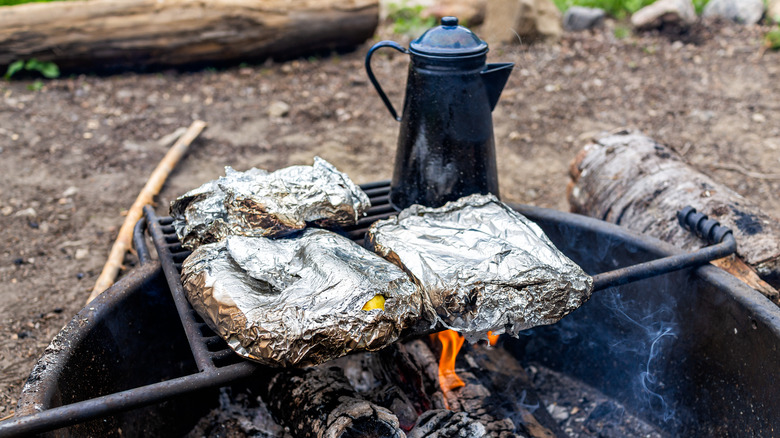 Breakfast sandwiches over a campfire