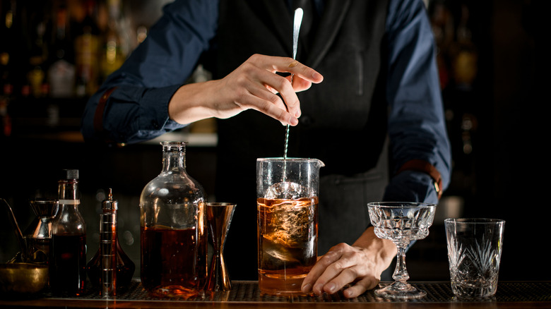 Closeup of a bartender making a cocktail